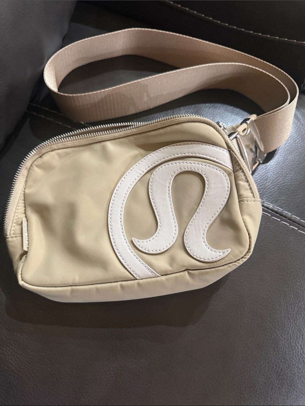 Rare find.  lululemon athletica beige and cream crossbody belt bag